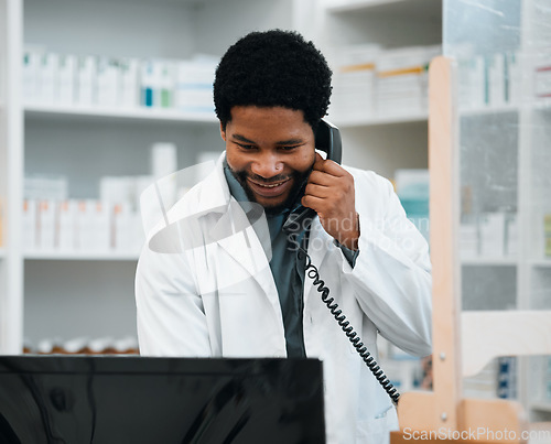 Image of Phone call, pharmacy and black man on computer for medicine, prescription and medication service. Healthcare, medical care and African pharmacist speaking for telehealth, consultation and online