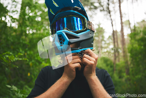 Image of Helmet, hands and person in forest, cycling outdoor and safety with adventure and fitness. Protection, gear and travel, athlete and extreme sports with exercise, training and challenge with biking