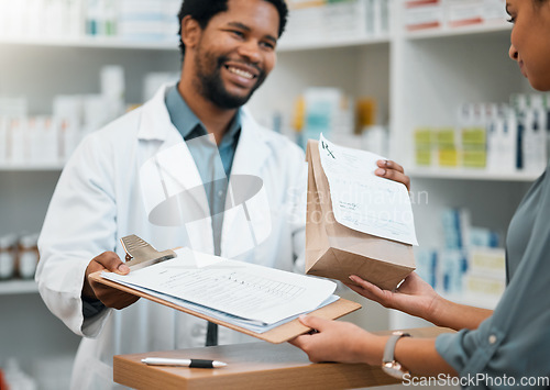 Image of Happy pharmacist, paper bag and patient with clipboard for signature, prescription or consultation at pharmacy. Black man, medical or healthcare professional giving medication to sick customer