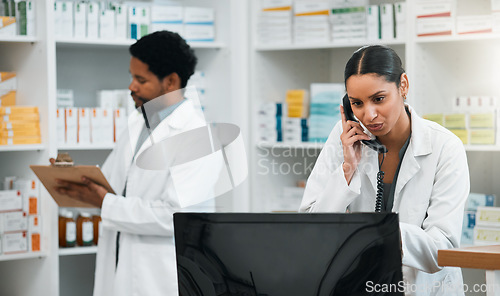 Image of Phone call, counter and pharmacy woman for medicine, conversation and virtual healthcare support. Employee, medical person or pharmacist for checklist, computer and telephone with customer service