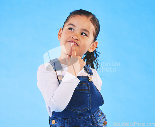 Image of Thinking, kid and girl with ideas, decision and problem solving on a blue studio background. Mockup space, child and model with doubt, planning and inspiration with questions, remember or opportunity