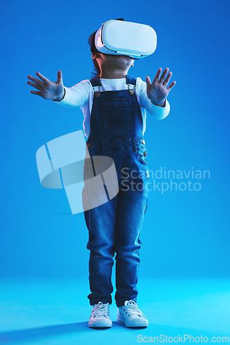 Image of Future, girl and kid virtual reality glasses, esports and online gaming on a blue studio background. Child, vr headset or model with video game, augmented reality or augmented reality with technology