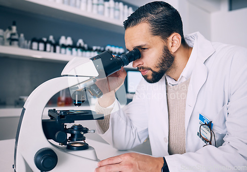 Image of Microscope, research and man scientist looking for sample analysis or experiment in a laboratory for a medical project. Science, equipment and professional test bacteria or DNA in a chemistry lab