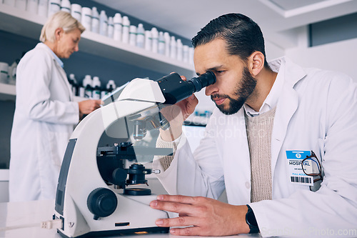 Image of Scientist man, microscope analysis and lab for medical research, molecules or particles of bacteria at pharma job. Science team, people and vision for studying virus with pharmaceutical innovation