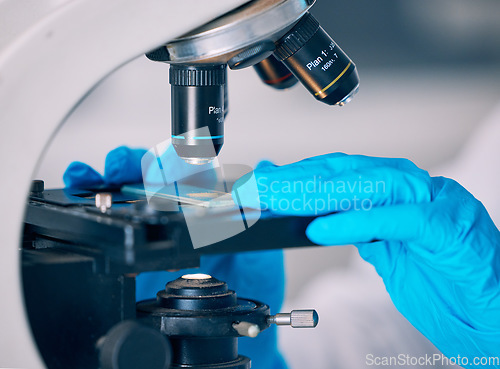 Image of Microscope, hands and science worker research with technology testing for a pharmaceutical or medical study. Chemistry, biometric and molecule analytics equipment for particles and person in hospital
