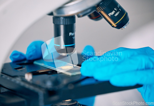 Image of Microscope, worker hands and science worker research with technology testing for a pharmaceutical or medical study. Chemistry, biometric and molecule analytics for particles and person in hospital