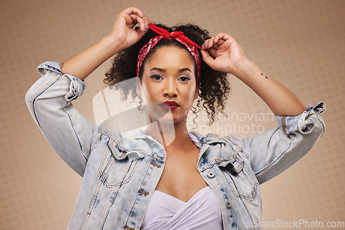 Image of Fashion, aesthetic and portrait of woman with hipster style isolated in a studio brown background feeling confident. Proud, cool and young creative person with funky clothing and beauty as a designer