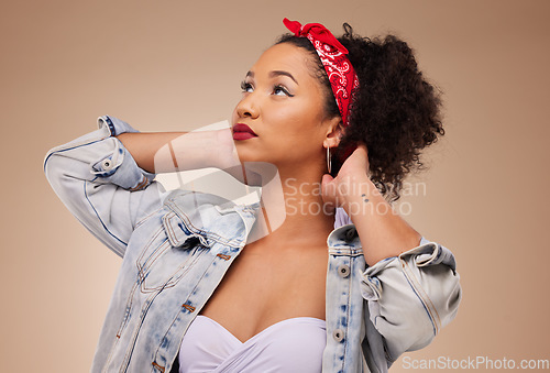 Image of Fashion, thinking and woman with hipster style isolated in a studio brown background feeling confident. Proud, cool and young creative person with funky aesthetic or clothing and beauty as a designer