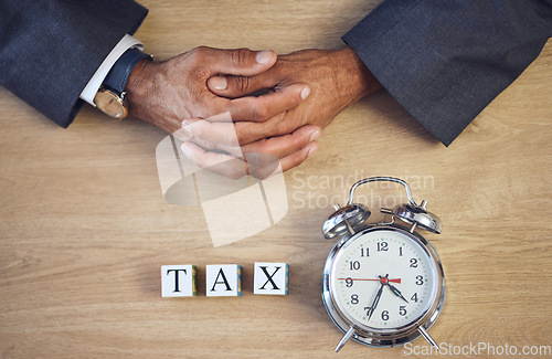 Image of Taxes, clock and hands of person with building blocks on table from above for planning, future and investment. Budget, payment and accounting with alarm for time, income and economy mockup space