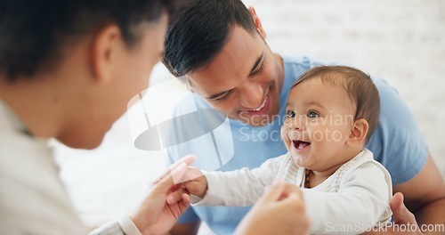 Image of Baby, playing and father with mom in bedroom with happiness with love or care on weekend. Happy, infant and playful with parents or dad for bonding at family home with funny expression or newborn.
