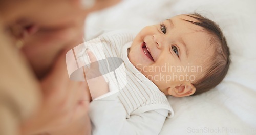 Image of Baby child, mother and peekaboo on bed with stretching legs, game and funny surprise in family house. Mama, young infant kid and playing together with wow, comic bonding and care with love in nursery