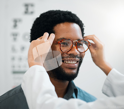 Image of Black man, glasses and hands, vision and eye care, test and optometry with health and smile. Prescription lens, frame choice and healthcare, eyewear and optometrist with wellness and medical service