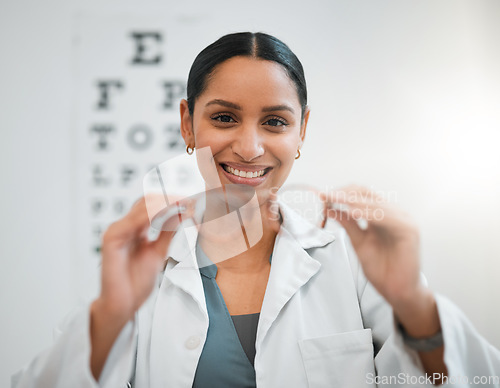 Image of Doctor, woman and glasses, vision and eye care, portrait and optometry with health and smile. Prescription lens, frame choice and healthcare, eyewear and optometrist with wellness and medical service