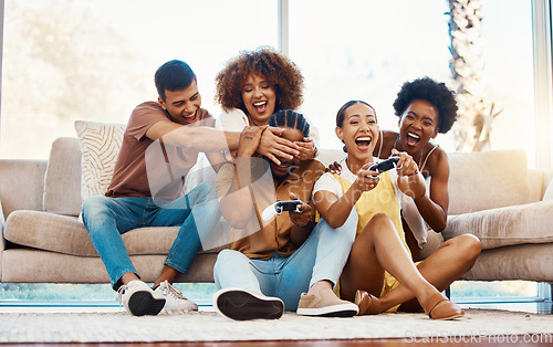 Image of Group of friends on sofa playing video game, fun and relax in home living room together with internet controller. Online gaming, virtual esports app and couch happy gamer men and women in apartment.