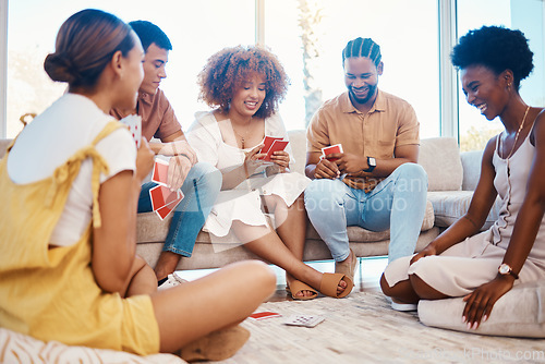 Image of Relax, happy people or friends playing cards, poker or black jack at home for gambling together in a party. Smile, men or group of women laughing in living room in a fun match or game on holiday