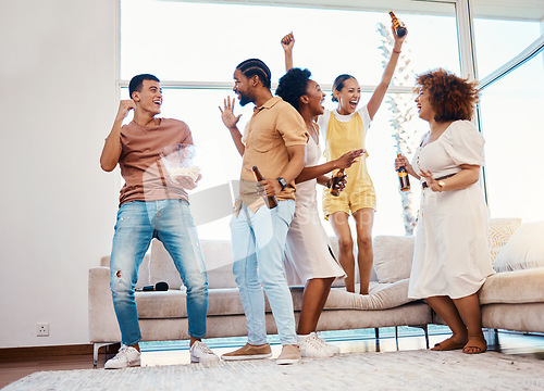 Image of Friends, fun and beer to celebrate at a house with happiness, drinks and people in a lounge. Diversity, alcohol and party with men and women together for celebration, gathering or reunion at home