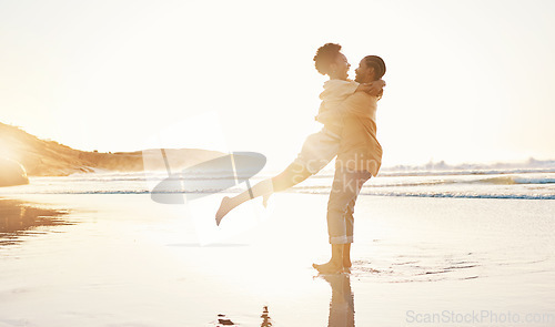 Image of Beach, sunset and happy couple hug, love enjoy quality time together on South Africa vacation, travel or romantic date. Marriage partner, happiness and excited people embrace on anniversary holiday