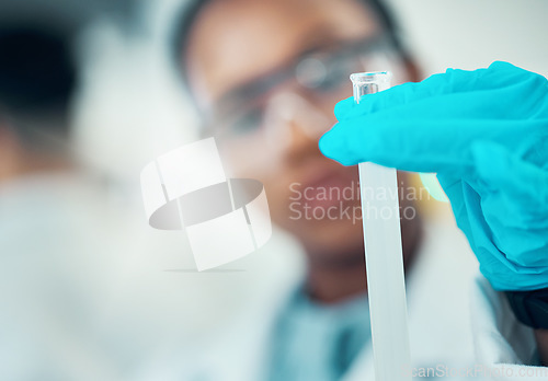 Image of Science, blurred background and woman with test tube in laboratory, medical engineering and mockup. Biotechnology, pharmaceutical and research, scientist or lab technician checking solution in glass.