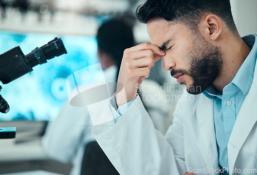 Image of Stress, man or tired scientist with headache in a laboratory with burnout, migraine or bad head pain. Exhausted, anxiety or frustrated expert with medical or science research with fatigue or tension