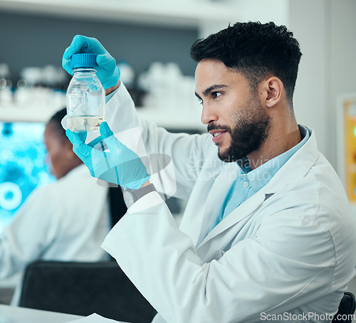 Image of Science, research and man with solution in bottle in laboratory, results and medical engineering with water sample. Biotechnology, botany study and nature, scientist or lab technician checking glass.