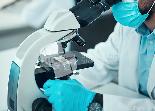 Image of Person, science and microscope for laboratory research, blood test and dna or virus analysis with glass slide. Professional scientist in medical or biotechnology and lens check for covid or particles