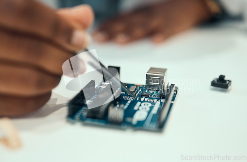 Image of Hands, engineering and hardware with person in laboratory for research, monitor and programming. Technology, data and microchip with closeup of scientist for electrician, maintenance and cpu system