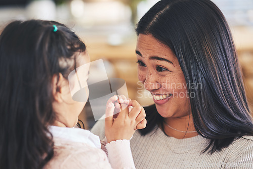 Image of Smile, love and playful with mother and daughter on sofa for happy, care and support. Funny, calm and relax with woman and young girl embrace in living room of family home for peace, cute and bonding