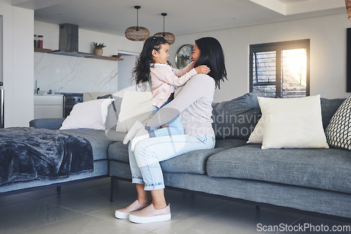 Image of Relax, happy and playful with mother and daughter on sofa for love, care and support. Funny, calm and smile with woman and young girl embrace in living room of family home for peace, cute and bonding