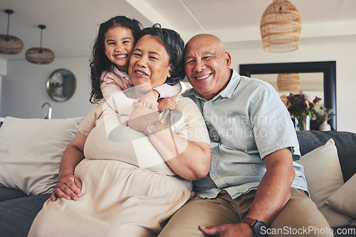 Image of Happy, hug and portrait of grandparents and child on sofa for smile, bonding and support. Love, happiness and relax with Mexico family and embrace in living room at home for calm, cheerful and peace