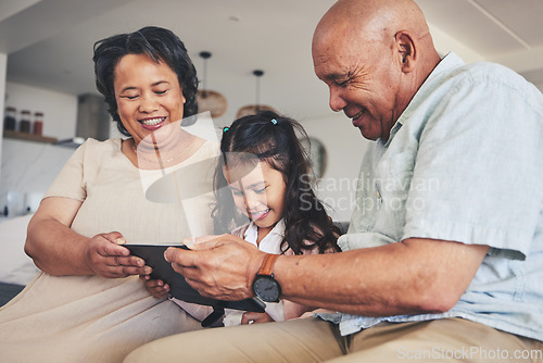 Image of Happy family, child or grandparents with tablet for elearning or studying for education or remote learning at home. Development, grandfather or grandma with girl reading online ebook or playing games