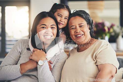 Image of Happy, women and generations with portrait of family on sofa for smile, bonding and support. Hug, relax and grandparent with mother and child in living room at home for calm, care and peace together