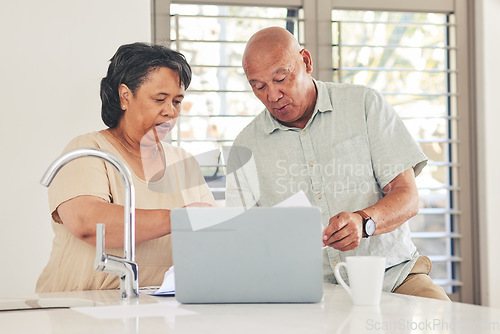 Image of Laptop, planning and finance with old couple in kitchen for budget report, payment and mortgage. Accounting, online banking and savings with senior man and woman for investment, retirement and taxes