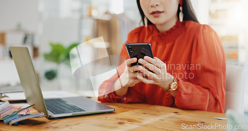 Image of Woman, hands and smartphone for typing, connection and communication with social media, chatting and sms. Laptop, hand and female person with cellphone, mobile app and network for texting or message