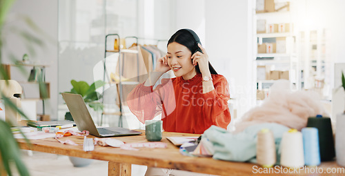 Image of Business woman, laptop and headphones for music while working at office desk, agency or company. Happy worker listening to radio, audio or sound on computer, internet and online podcast on technology