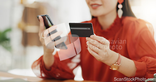 Image of Happy woman, credit card and phone for business online shopping, trading or fintech payment in office startup. Asian fashion person with bank information on cellphone for website loan or transaction