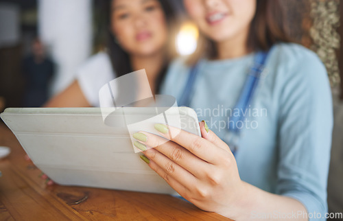 Image of Restaurant, tablet and hands of women for online menu, food options and order for lunch, meal or dinner. Coffee shop, cafe and happy friends on digital tech for social media review, website and app