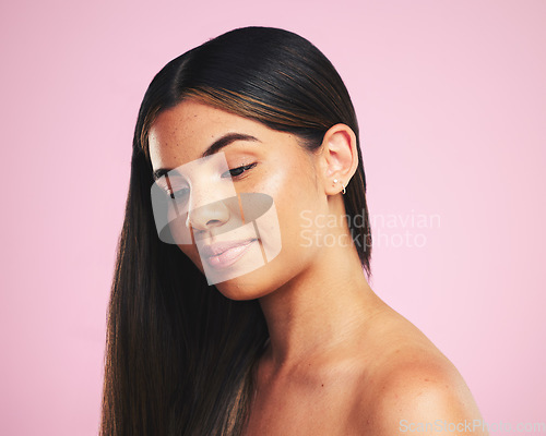 Image of Thinking, hair care and woman with cosmetics, growth and dermatology on a pink studio background. Ideas, person and female with volume, aesthetic or luxury with makeup, natural beauty or healthy skin