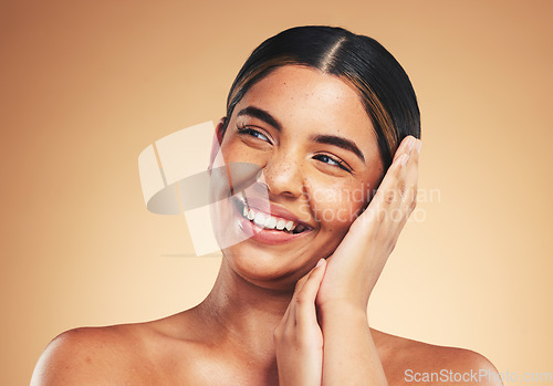 Image of Beauty, smile and woman in studio for skincare with hands on face for cosmetic results on brown background. Happy, wellness and lady model touch glowing skin, cosmetology or dermatology satisfaction