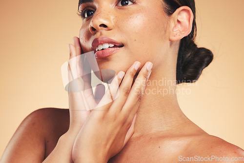 Image of Skincare, beauty and face of woman with hands for wellness, health and facial care in studio. Dermatology, spa and natural person on brown background in cosmetics, glow and touch for satisfaction
