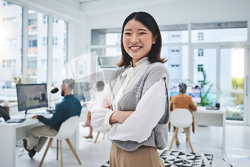 Image of Happy, woman and Asian employee with arms crossed in office, workplace and confident in working for professional startup. Portrait, smile and person with pride and happiness in Singapore business