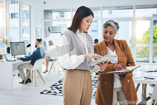 Image of CEO, tablet or businesswoman with mentor in discussion with notebook for news, info or advice. Collaboration, leader or Asian intern talking, learning or speaking of data analytics in digital agency