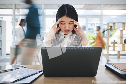 Image of Stress, headache and asian woman on laptop in busy office with vertigo, mistake or disaster. Anxiety, migraine and manager frustrated by online glitch, 404 or internet, delay or mental health crisis