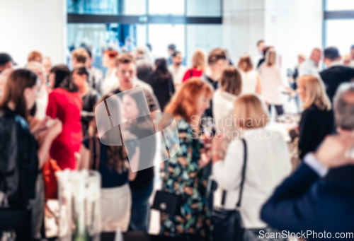 Image of Blured image of businesspeople at coffee break at conference meeting.