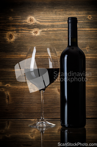 Image of Wine bottles with glass