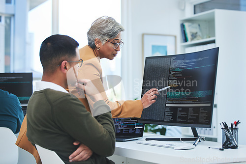 Image of Coaching, mentor and programmer with business people and computer for coding, developer or information technology. Meeting, code review and feedback with employees in digital agency for cybersecurity