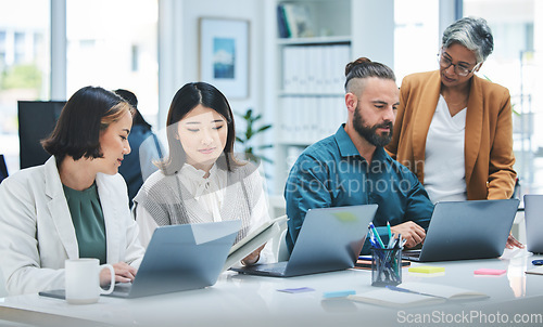 Image of Coworking, laptop and staff with senior mentor and teamwork for online project. Planning, computer and working business people with digital market research for marketing company with collaboration