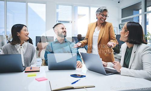 Image of Happy people, laptop and meeting, marketing team at digital agency, creative group and research online. Man, women and diversity, productivity and business with senior leader and branding strategy