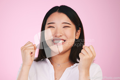 Image of Happiness, studio face and asian woman celebrate success, achievement or winning promotion deal, giveaway or competition. Prize winner, award celebration or Japanese person excited on pink background