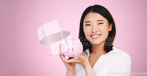 Image of Piggy bank, savings and finance, woman in portrait and mockup space with money isolated on pink background. Budget, future and cash, investment and profit, container for coins and growth in studio