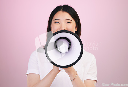 Image of Megaphone announcement, portrait and Asian woman with retail sales discount, promotion deal or broadcast news. Speech, studio or Japanese speaker noise, attention and voice opinion on pink background